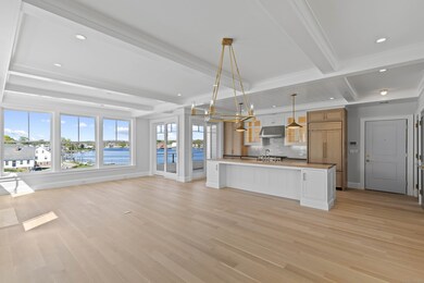 Glistening hardwood floors accent the main floor p