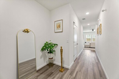 Hall featuring recessed lighting and wood finished floors