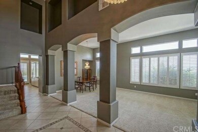 Formal living room and dining room with impressive