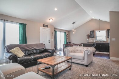 Vaulted ceilings & large windows!