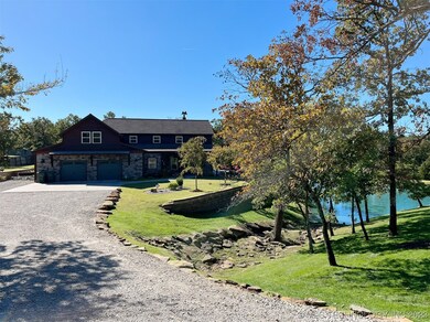 Front of House with Pond