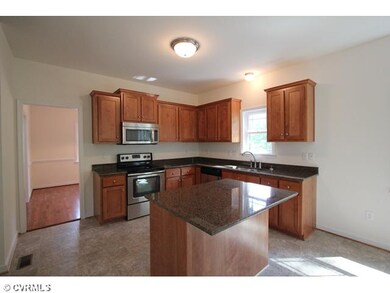Exterior Front - Photos are of the floor plan buil