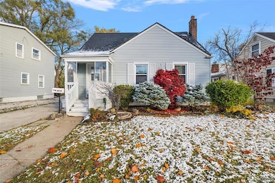 Bungalow-style house with a porch, a chimney, and a shingled roof