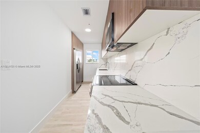 32 NW 14th Ave unit 103, Miami, FL 33125 - photo 6