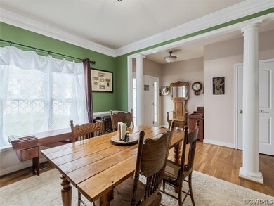 Formal dining room with chair rail, crown and wood