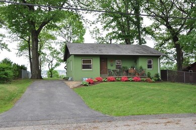 front exterior with driveway for off-street parkin
