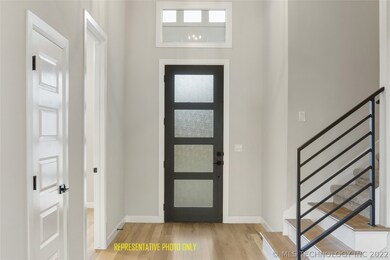 High ceiling entry. Picture is of previously finis