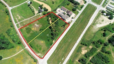 This aerial is looking northeast with FM 1093 in t