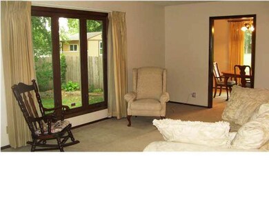 Living room. New windows in living, formal dining 