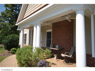 Exterior Front - Sunny patio porch with pretty bor