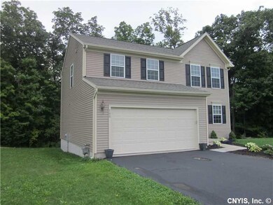 Exterior Front. Double garage with blacktop drivew