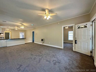 NEW CARPET IN LIVING, DINING AND ALL THREE BEDROOM