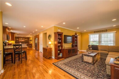 The open layout between the kitchen and dining are