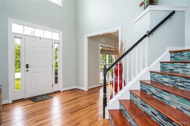 Foyer/entry area with view to formal living room