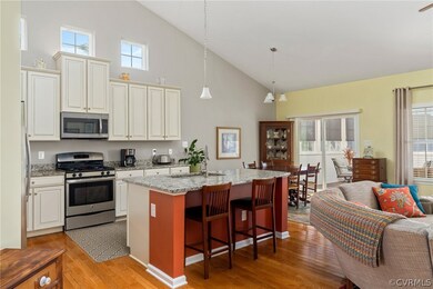 Updated kitchen with granite counters and abundant