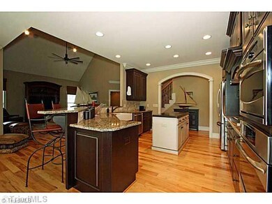 Kitchen. Opens onto the Den