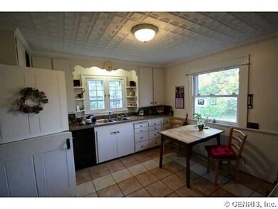 Kitchen. Tin ceiling, dutch door to dining room an