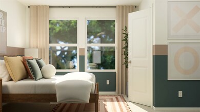 Bedroom featuring baseboards