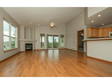 Vaulted great room and adjoining screen porch with