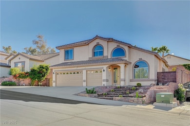 Mediterranean / spanish-style house with a garage, stucco siding, concrete driveway, and a tile roof