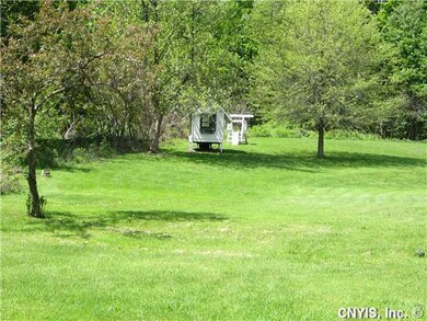 Yard/Garden. Children s playhouse and slide.