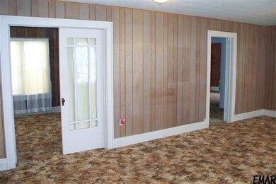 Entry into one bedroom and into the hallway