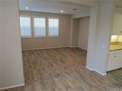 LARGE OPEN LIGHT AND BRIGHT FAMILY ROOM OFF KITCHE