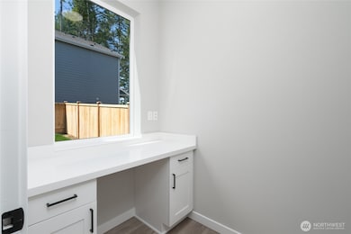 Photos are of another home in the community and are for illustration purposes only to reflect typical finishes.  May depict seller enhancements.  Colors and options may vary.