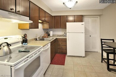 Spacious and roomy kitchen with newer countertops!  Just beyond is a roomy in-suite laundry/pantry room.