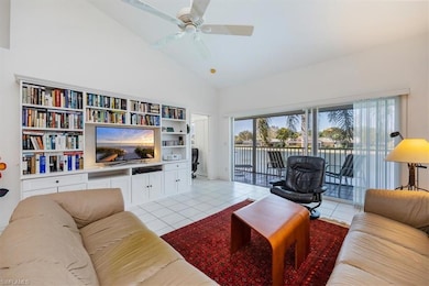 Living room featuring high vaulted ceiling, ceilin