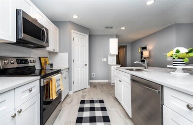 Model Photo Not of Actual Home-Microwave, Cooktop,