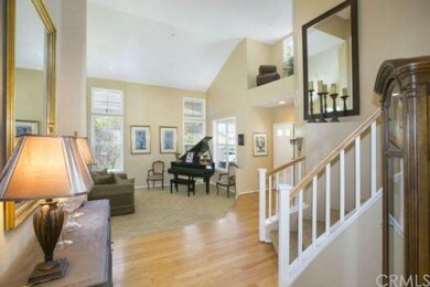 Another view of the foyer and the formal living ro