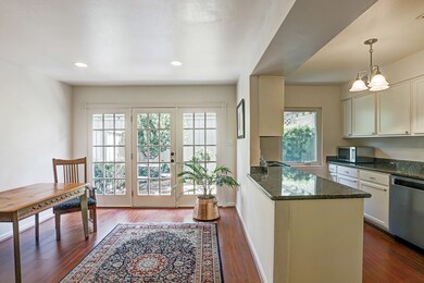 Breakfast room with a wall of light and access to