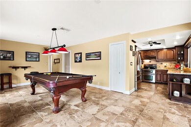 Huge game/bonus room off of kitchen and separate f