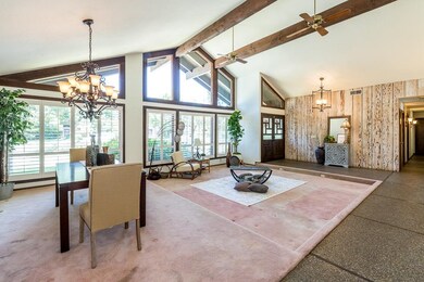 Fabulous wall of windows, vaulted ceilings with wo