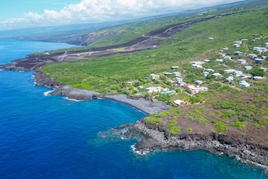 Sweeping coastline perspective showing the neighborhood’s proximity to the Pacific and Pebble Beach below.
