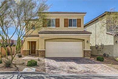 View of front of property featuring stone siding,