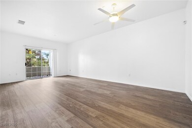 View of dining room and living room from front door.