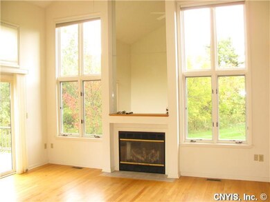 Family Room. Cathedral ceilings with a gas firepla