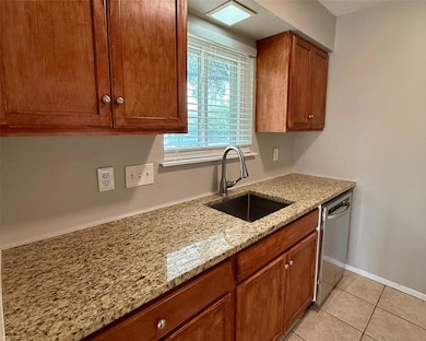 Kitchen featuring stainless steel dishwasher, bro