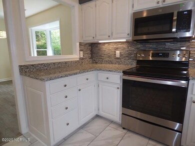 Kitchen - new granite countertops, backs