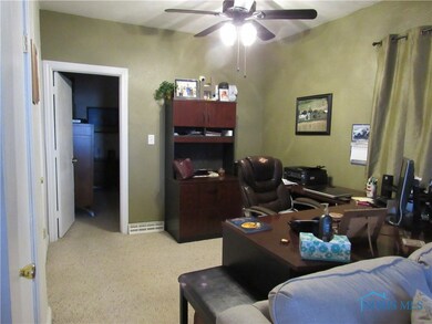 Nice den area set aside from living room.