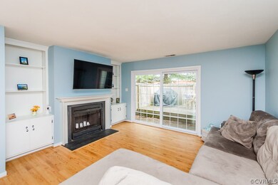 FAMILY ROOM W/ BUILT-INS. FIREPLACE, HW FLOORS, SL