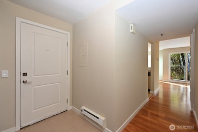 Down the hall and to the right is the spacious living area.