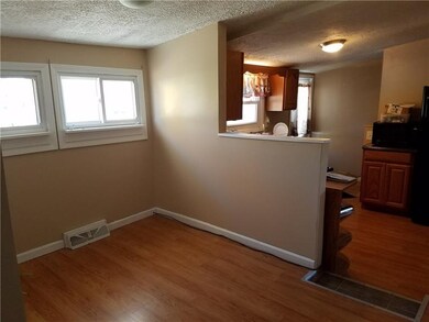 Room can be used as dining room, den or office