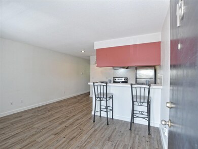 Kitchen featuring stainless steel appliances, woo