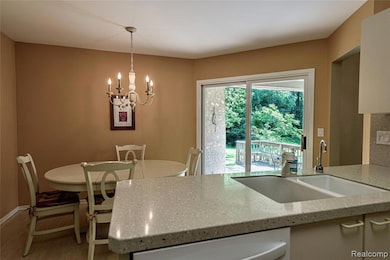 Kitchen opens to breakfast area