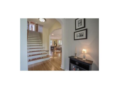 Entry hall with view into Living Room.