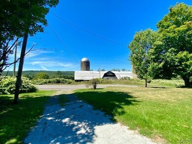 View from top of driveway, barn has the well insid