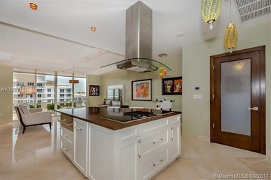 Kitchen Island with Radianz Sechura Mocha Polished